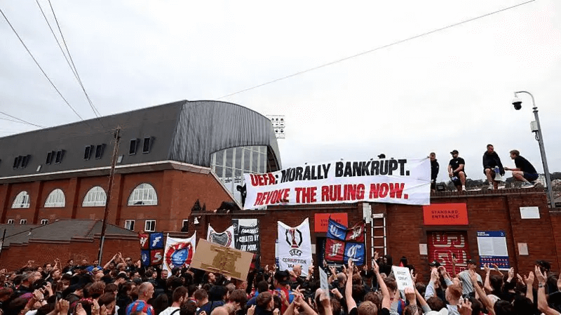 Palace fans protest Uefa's Conference League demotion
